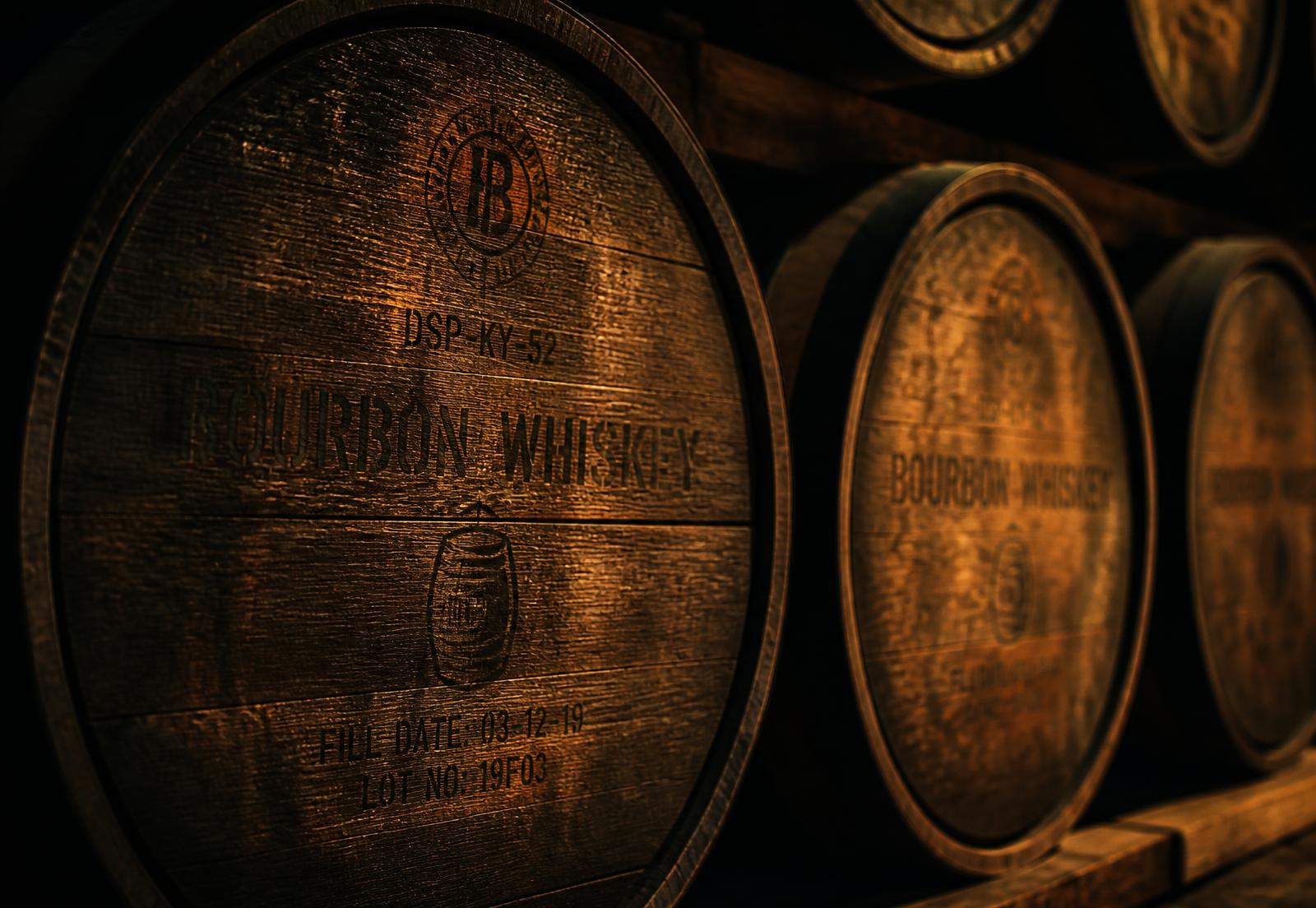 Charred oak bourbon barrels resting in a dim rickhouse